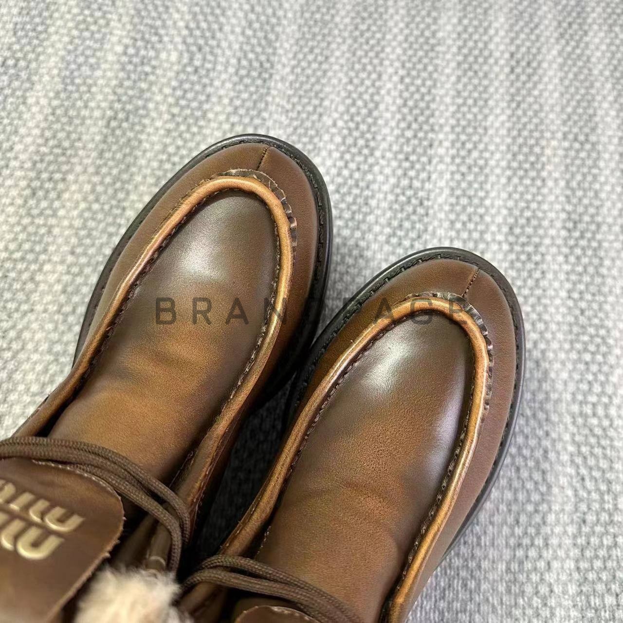 Сапоги кожаные Miu Miu BPLUX12440 Сапоги кожаные Miu Miu BPLUX12440