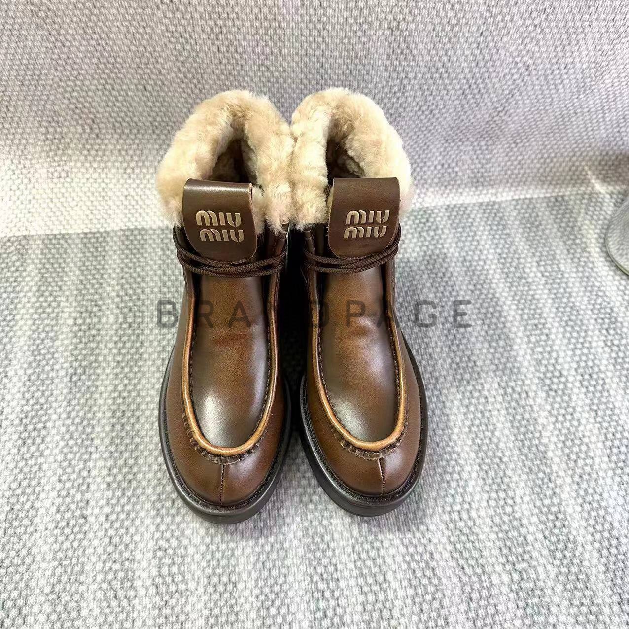 Сапоги кожаные Miu Miu BPLUX12440 Сапоги кожаные Miu Miu BPLUX12440